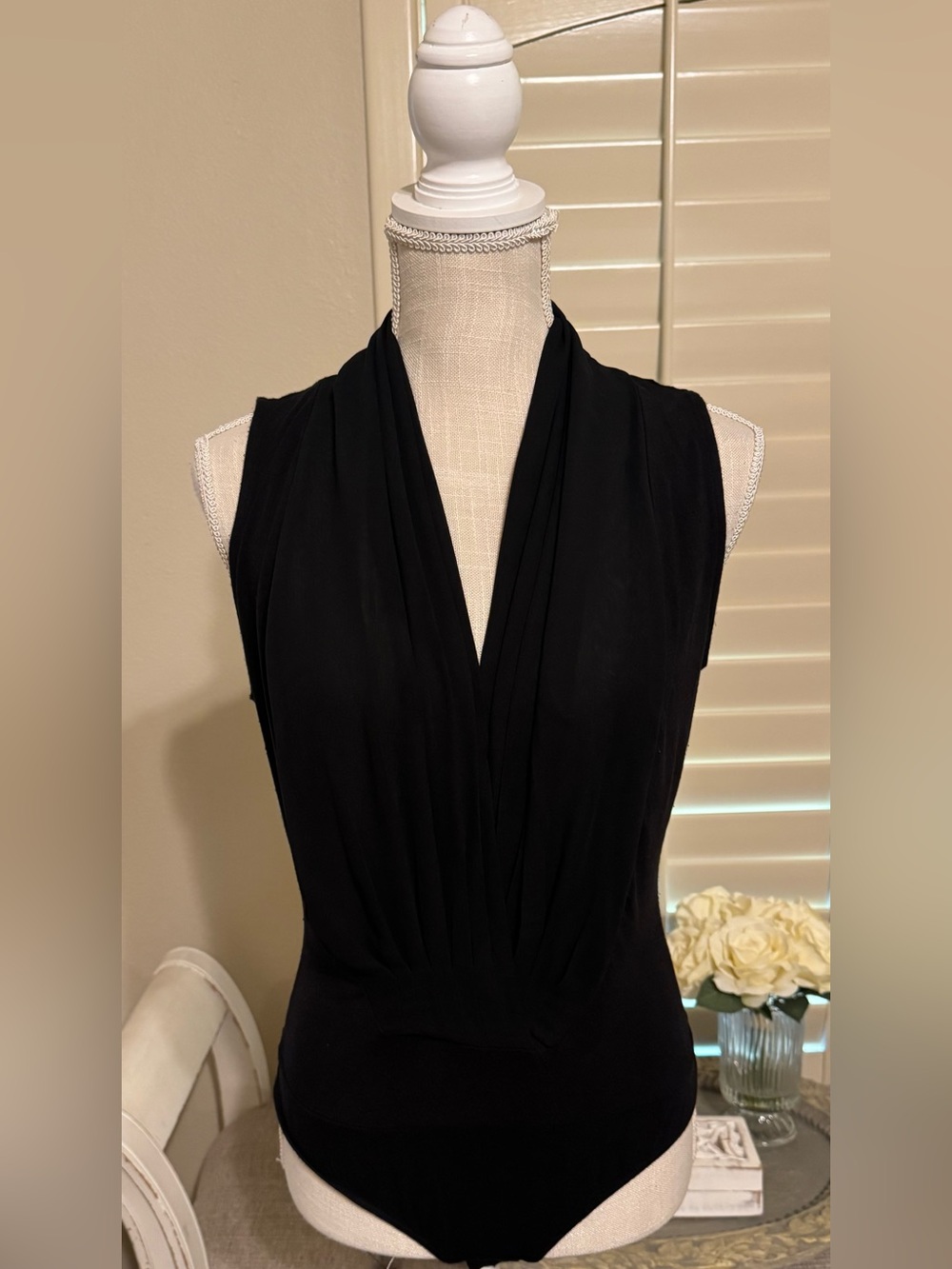 New York and Company Sleeveless Draped V-Neck Bodysuit in Black